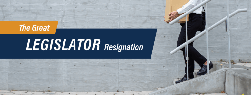 Person walking out with box 